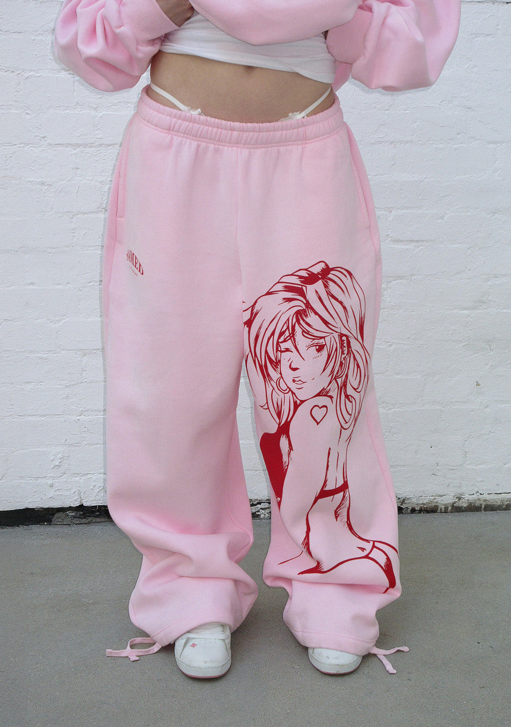 X-RATED OVERSIZED SWEATPANTS BABY PINK